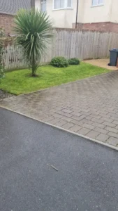 Block paving Poole team laying high-quality bricks for a new driveway surface