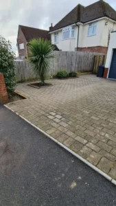 Skilled block paving in Poole workers installing a long-lasting driveway surface with precision