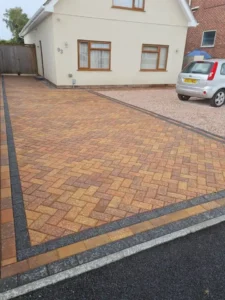 Professional block paving in Poole installation featuring a patterned driveway design