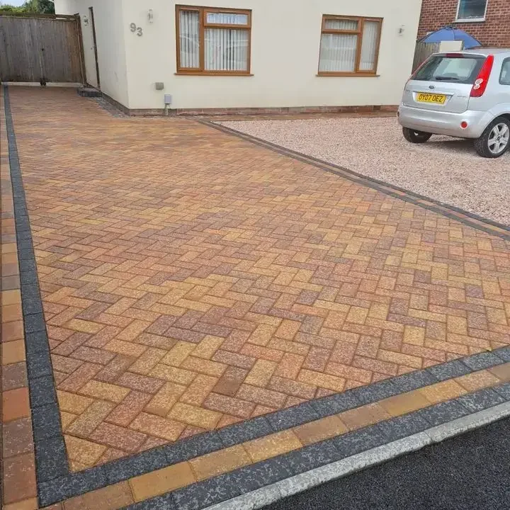 Professional block paving in Poole installation featuring a patterned driveway design