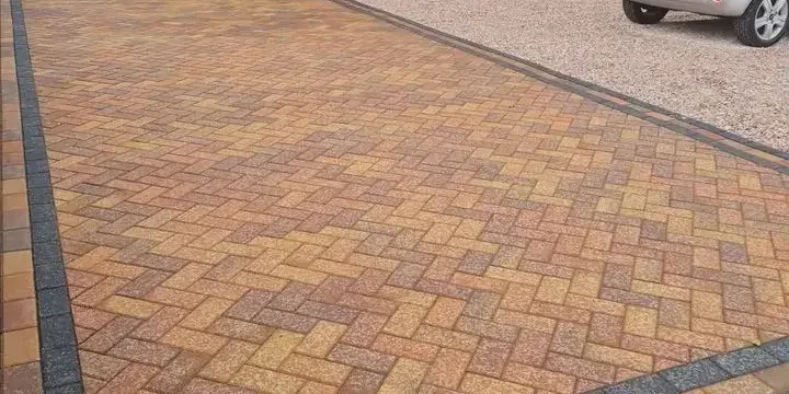 Professional block paving in Poole installation featuring a patterned driveway design